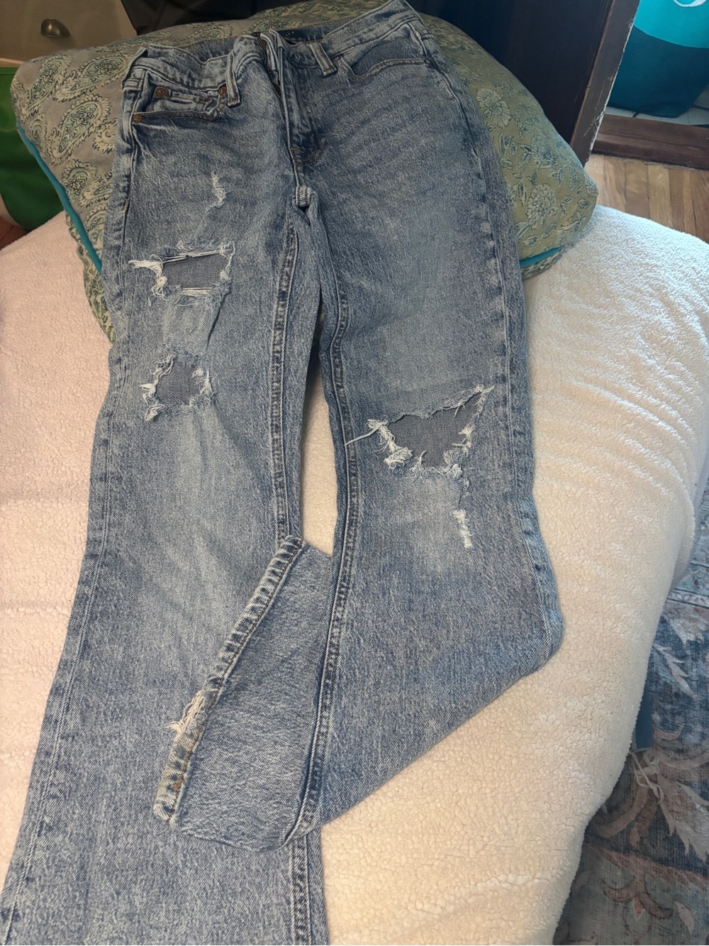 Women's Distressed Light Blue Jeans